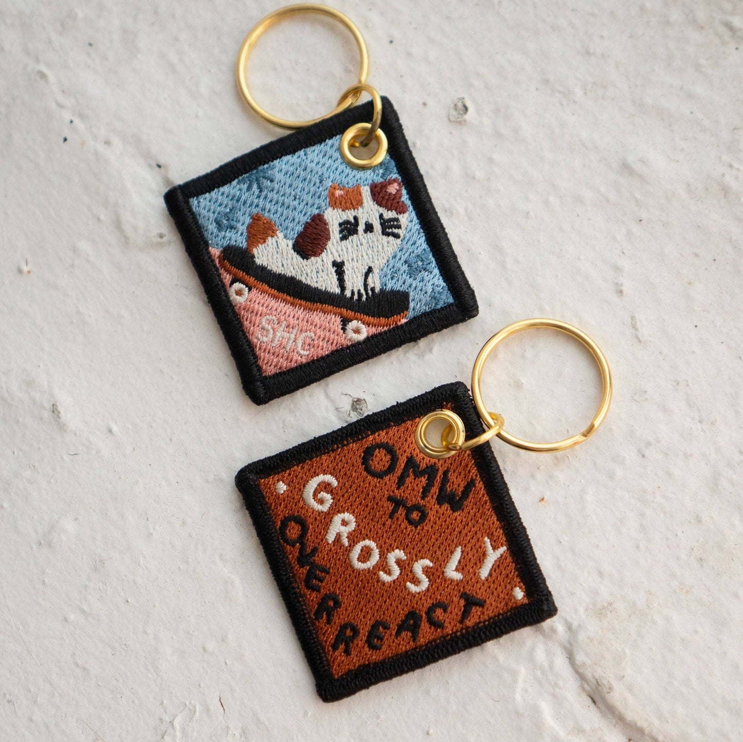 OMW to Overreact Embroidered Keychain