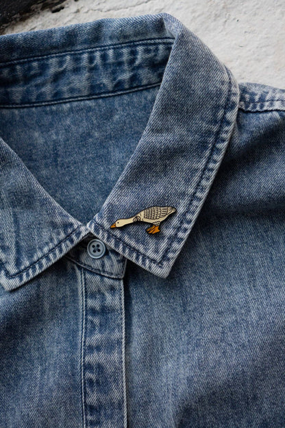 Reaching Enamel Pin