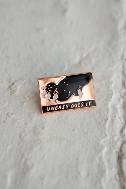 Uneasy Does It Enamel Pin